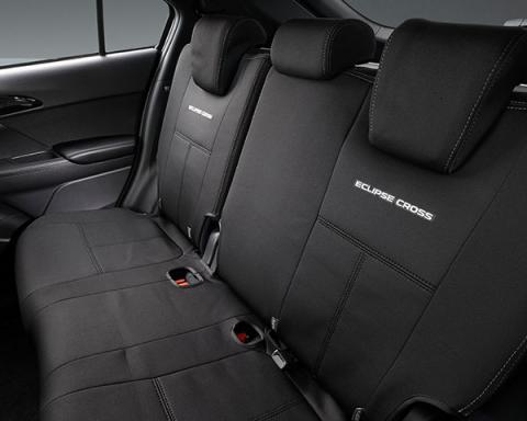 Interior of Eclipse Cross showing branded seat covers in black