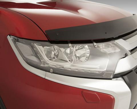 Close up image of the headlights of the Mitsubishi Eclipse Cross SUV displaying the Headlight Protector Set.