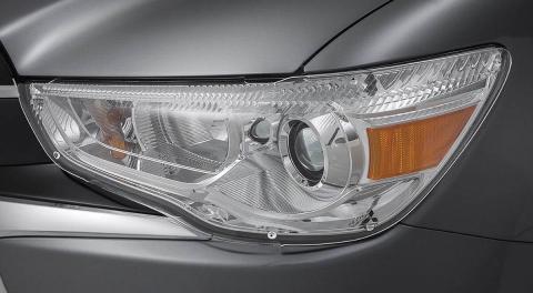 A close-up shot of  headlamp protector on a grey Mitsubishi ASX