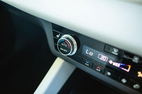 Close up shot of aircon controller switch in next gen Mitsubishi Outlander